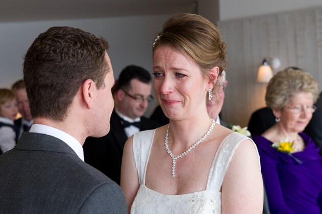 emotional brides cries tears of joy during her wedding ceremony