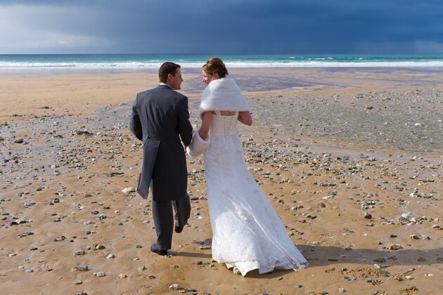 beach wedding photograph of bride and groom