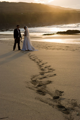 Bride and grrom on Porthmeor beach St Ives, Cornwall