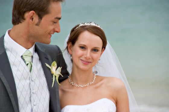 brides and grroms get married in Cornwall for beautiful beach wedding photographs