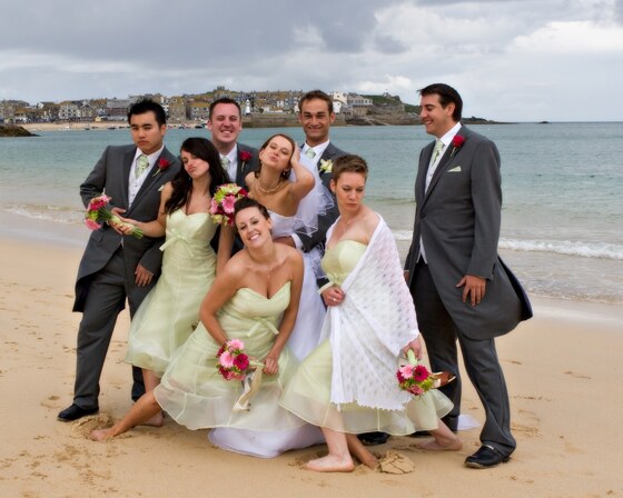 getting married in Cormwall groups wedding photographs on the beach