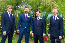 an informal group of the groom best man and ushers