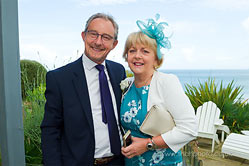 bride's parents looking very happy