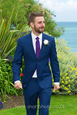 relaxed, natural photograph of the groom before the wedding ceremony 