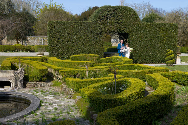 Cornwall wedding reception photo of bride and groom in the gardens at Cornwall wedding venue Rosteague Etstate