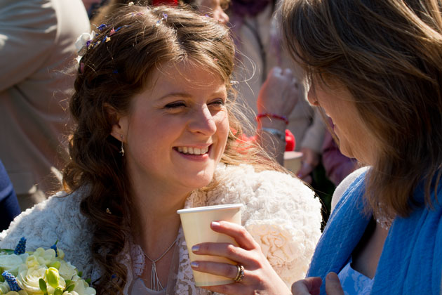 reportage photograph of bride and wedding guest