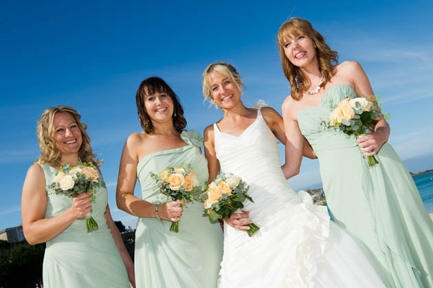 bridesmaids holding their wedding flowers photographed by Shah Photography