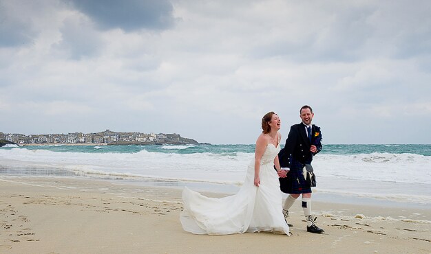 a favourite photograph from a wedding at St Ives taken on Porthminster beach in Cornwall by Cornwall photographer Pervaiz Shah