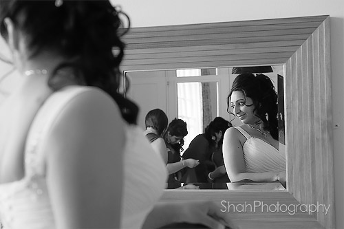 bride's reflection in the mirror