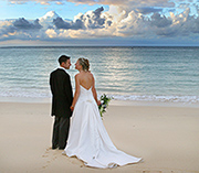 Izzy and Phil photographed on Porthminster beach St Ives on their wedding day