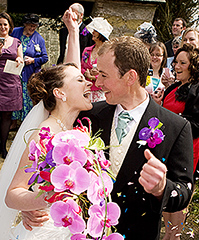 Anna of wedding flowers in Cornwall with husband Ollie at the church