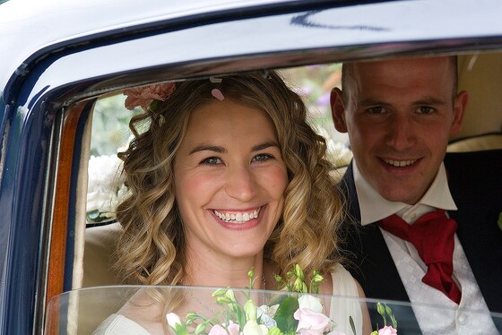 wedding photograph of bride and groom at Gwithian sand dunes near Hayle