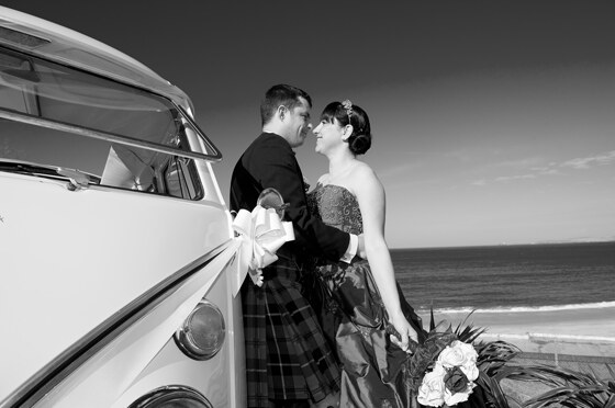 Strawberry Leisure's VW Lola the beach and the bride and groom work to create this punchy photo in black and white