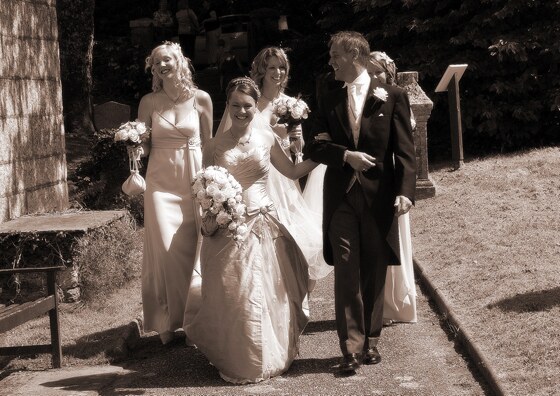 The brides arrival with bridesmaids and father of the bride