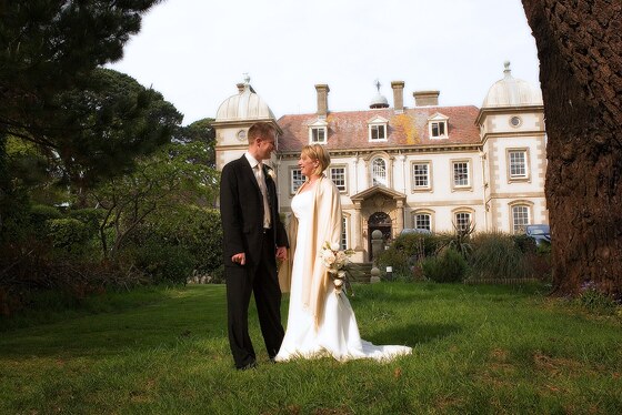 Bride and groom after their wedding breakfast at fowey Hall