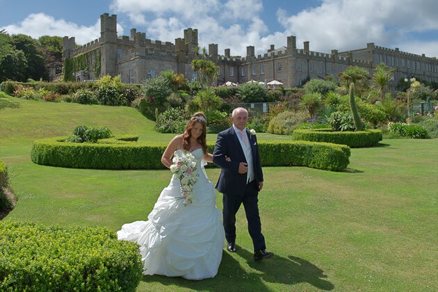 bride escorted by her father wedding photographer st ives cornwall