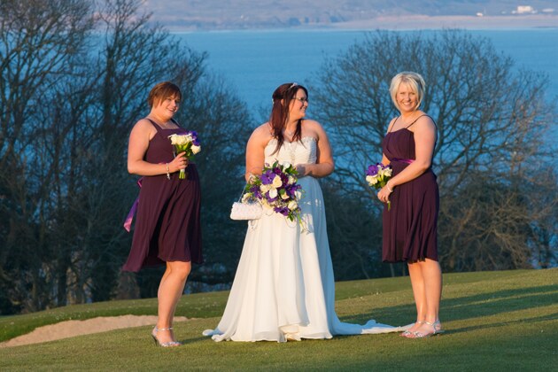 natural photography of bride with her bridesmaids