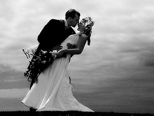 black and white wedding photograph of bride and groom