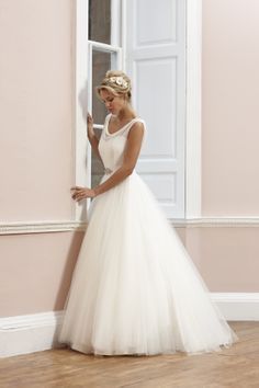 your wedding dress will enhance your wedding photographs