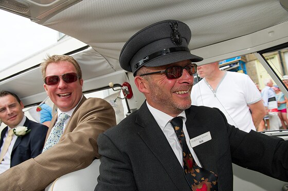 The groom best man and ushers with Bob of Strawberry Leisure at the wheel